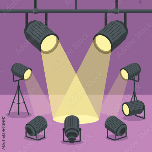 Stage lighting spotlights illuminating a performance area with beams of light