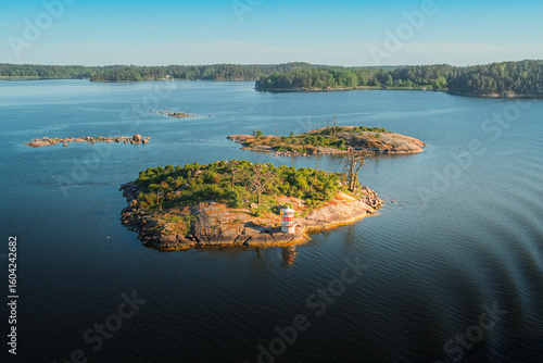 Photos Island with a lighthouse in the Stockholm archipelago