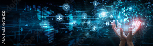 Network technician holding global network and telecommunications systems, 5G signals connectivity infrastructure mobile broadband communication voice data, and satellite networks.