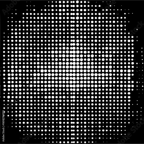 A black and white halftone pattern with a central concentration of white circles fading towards the edges