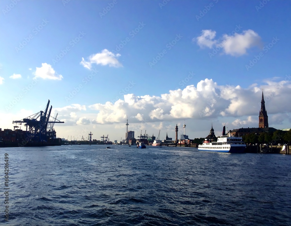 Fototapeta premium Harbor cityscape under a partly cloudy sky