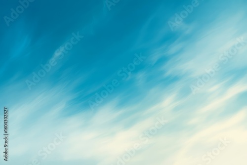 Wispy clouds across blue sky atmospheric