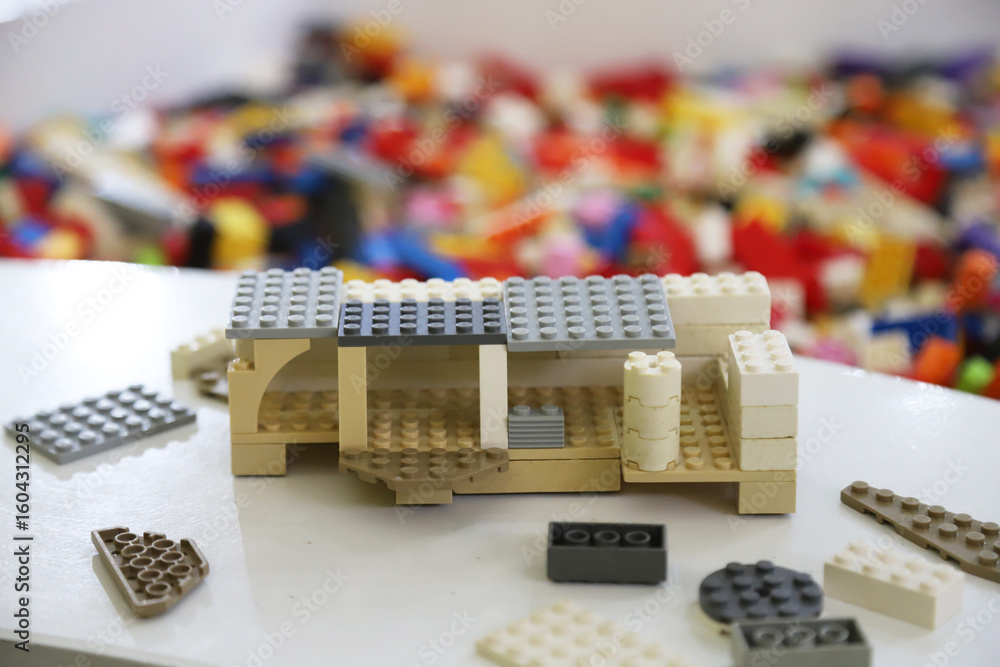 Naklejka premium Toy house built with Star Wars-style Lego blocks on a playground