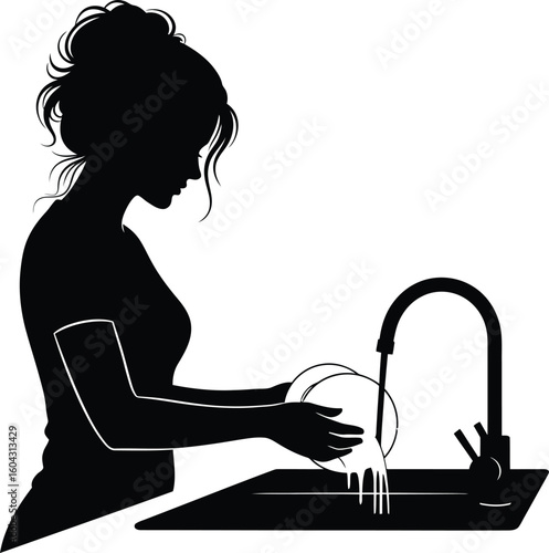Silhouette of a woman washing dishes at a sink 