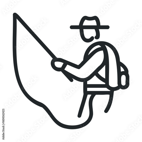 Man fishing with a net in a scenic outdoor location for leisure
