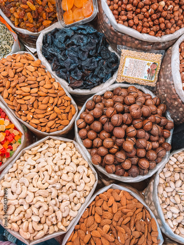 Dried fruits and nuts in trays at local street market