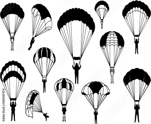 Three skydivers with parachutes isolated on white background
