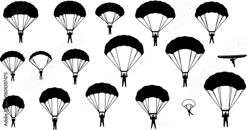 Three skydivers with parachutes isolated on white background
