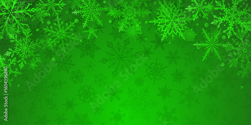 Christmas illustration in green tones featuring intricate snowflakes of varying sizes and designs arranged on top, with barely noticeable dark silhouettes of snowflakes in the background.