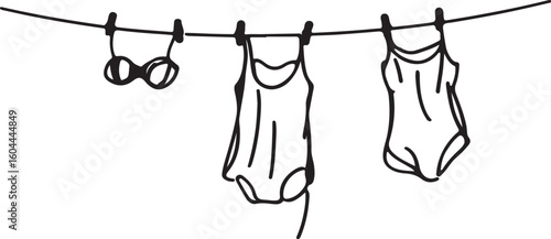 Swimwear drying on clothesline bathing suit bikini