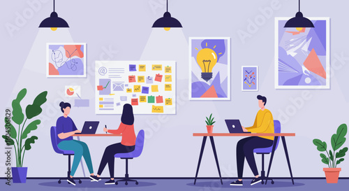 Modern Office Interior with People Working on Laptops.