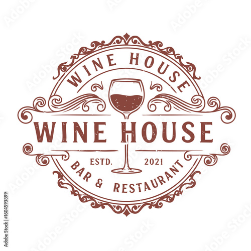 Vintage wine house logo with ornate floral design, wine glass icon, bar restaurant emblem.