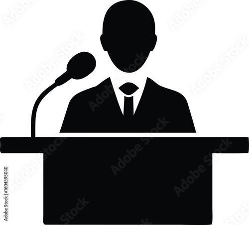 Black Silhouette Man in Suit at Podium with Microphone Delivering Speech
