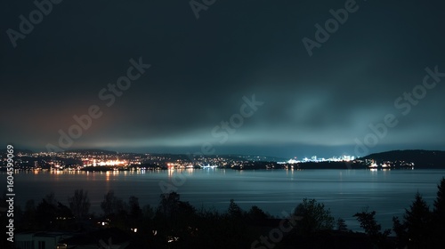 Oslo fjord urban-nature interface: distant city lights glow on dark abstract water. Modern landscape for wall art, ecological concepts, or travel website backgrounds. 