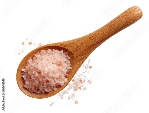 Pink Himalayan salt in wooden spoon