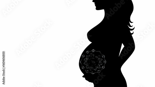Silhouette of pregnant woman with floral design on belly against a white background in black color