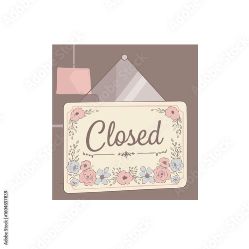 Decorative “Closed” sign with floral border in boutique