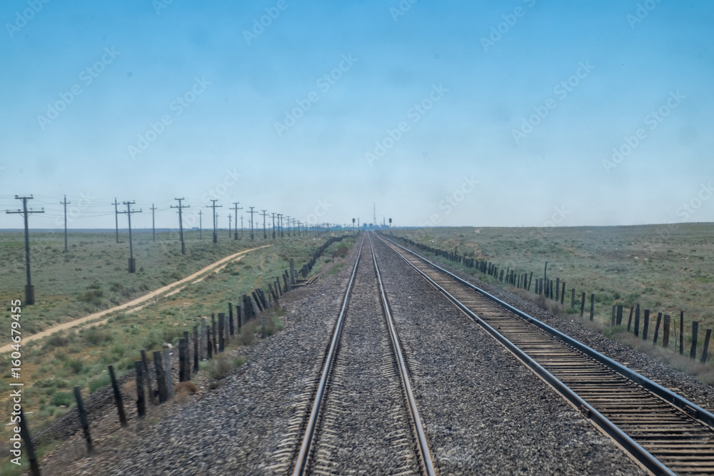 Obraz premium Railroad Tracks at Sunset in Kazakhstan