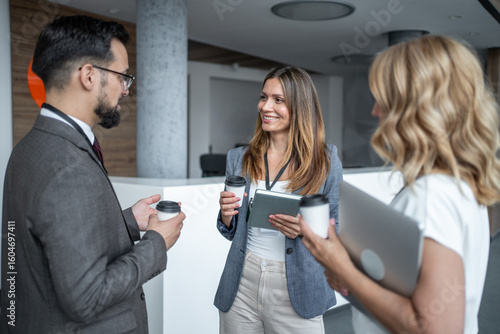 Business people networking during coffee break at conference