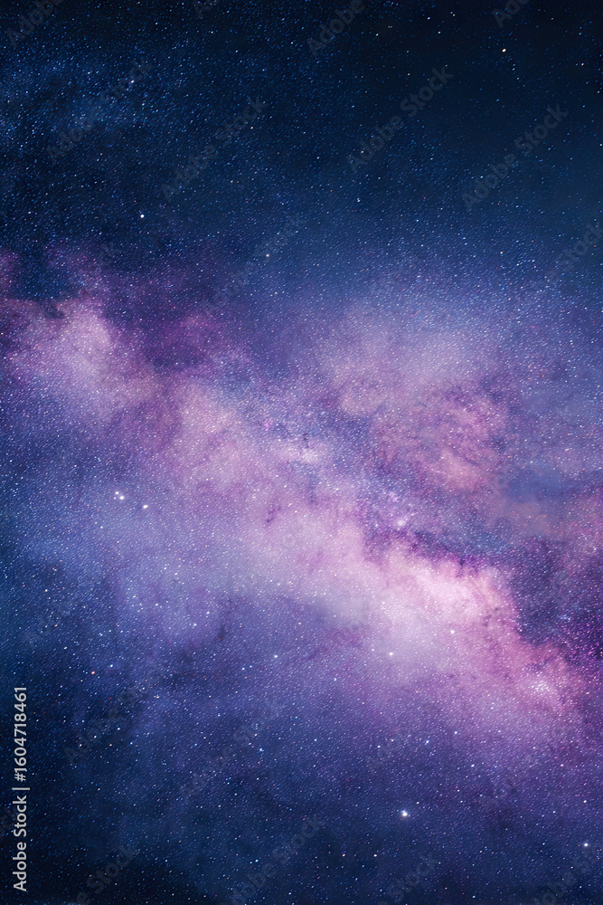 Fototapeta premium Dusty galaxy filled with stars and lilac clouds in a surreal atmosphere