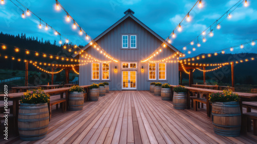 Barn Wedding Concept, Rustic barn wedding venue illuminated by romantic string lights dusk with wooden deck featuring wine barrel tables and twinkling bistro lights creating magical outdoor