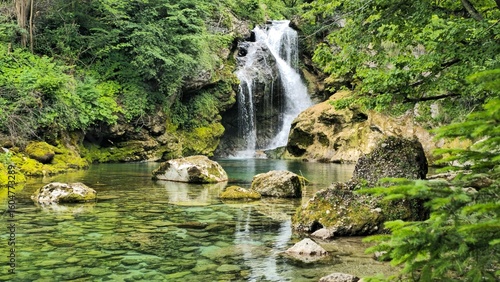 Waterfall and beautiful view on green river
