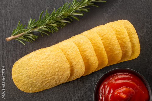 Crispy potato chips, top view, macro.