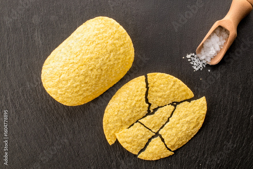 Crispy potato chips, top view, macro.