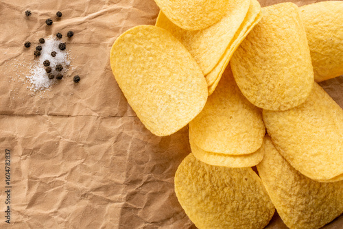 Crispy potato chips, top view, macro.