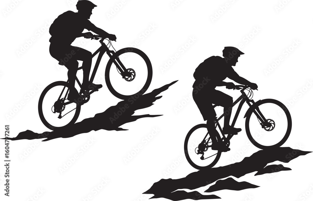Fototapeta premium Two mountain bikers riding downhill silhouette