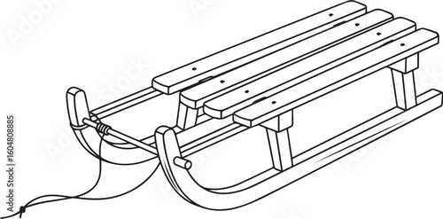 Wooden sled with rope for pulling winter snow