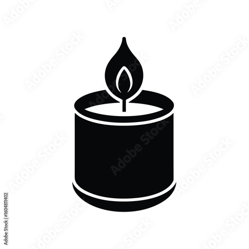 Silhouette a lit aromatherapy candle with a flame fire light