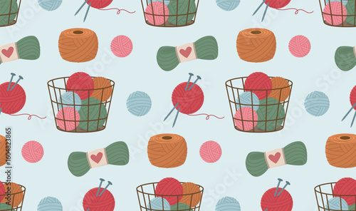 Seamless pattern with balls of yarn, threads and knitting needles. Cozy background with hand drawn craft elements
