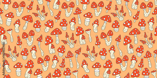 Seamless pattern with cute hand drawn colored fly agaric amanita mushrooms. Autumn background.