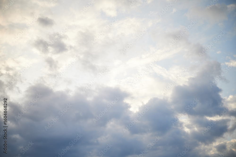 Fototapeta premium Calm sea under cloudy sky at sunset time