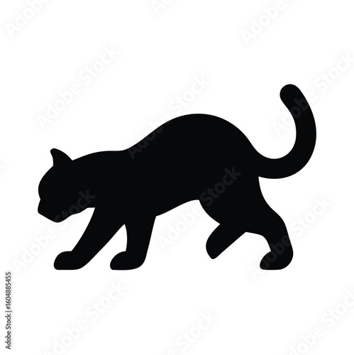 Black cat silhouette in a stalking pose