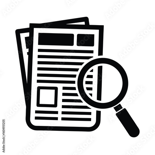 Magnifying Glass on Article Section of Newspaper