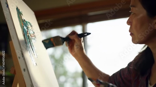 Artist painting on canvas