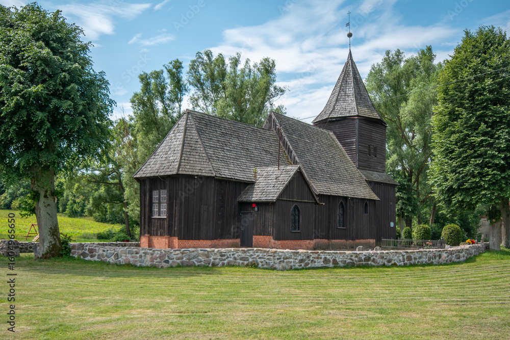 Fototapeta premium A wooden church in the village of Szczodrowo, Poland.