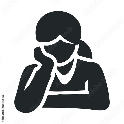 Silhouette of female student sitting with head on hand