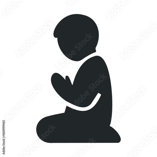 Silhouette of child praying: peaceful moment of reflection