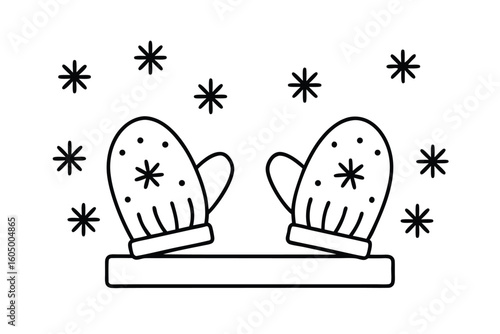 Mittens On Table With Snowflakes