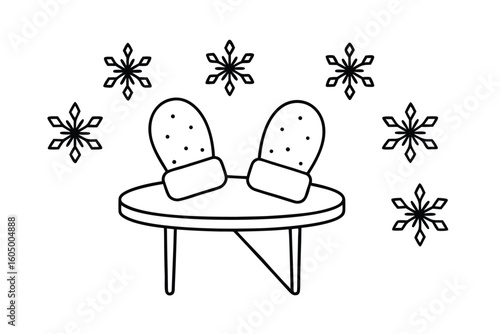 Mittens On Table With Snowflakes