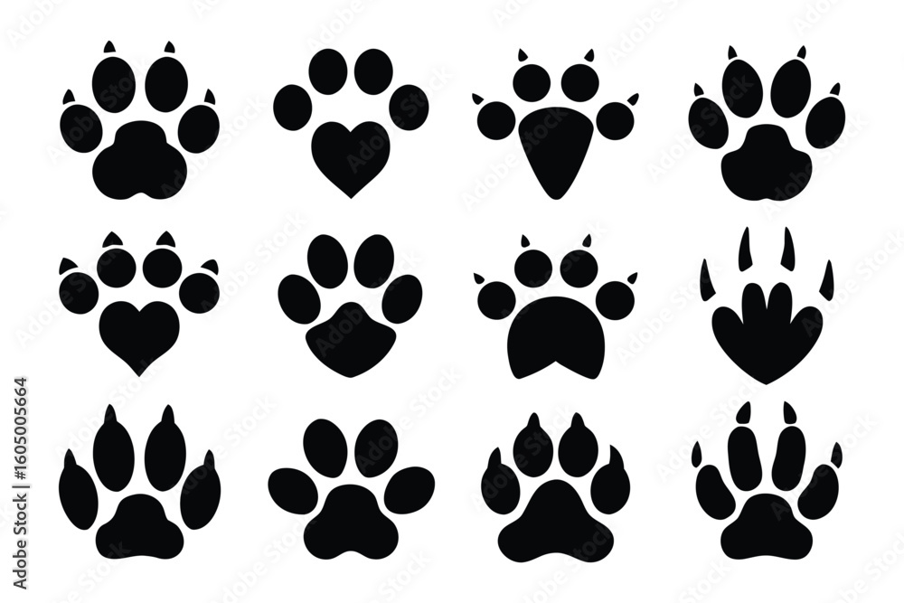 Fototapeta premium Collection of diverse animal paw print silhouettes showcasing various shapes and sizes for creative design elements