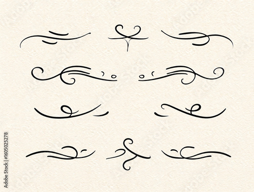 Collection of black decorative ornamental swirls and lines on beige paper