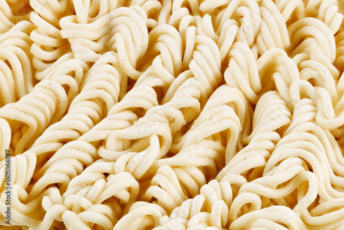 Dry raw instant noodles. Dried uncooked asian instant noodles texture, Close-Up
