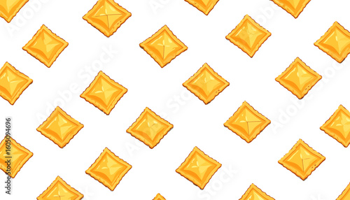 Golden diamond-shaped ravioli pasta with crimped edges and a puffy filling.