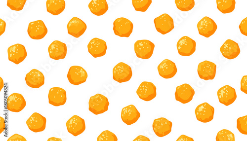 Crispy golden yellow fried chicken nuggets or cheese balls with a textured coating.