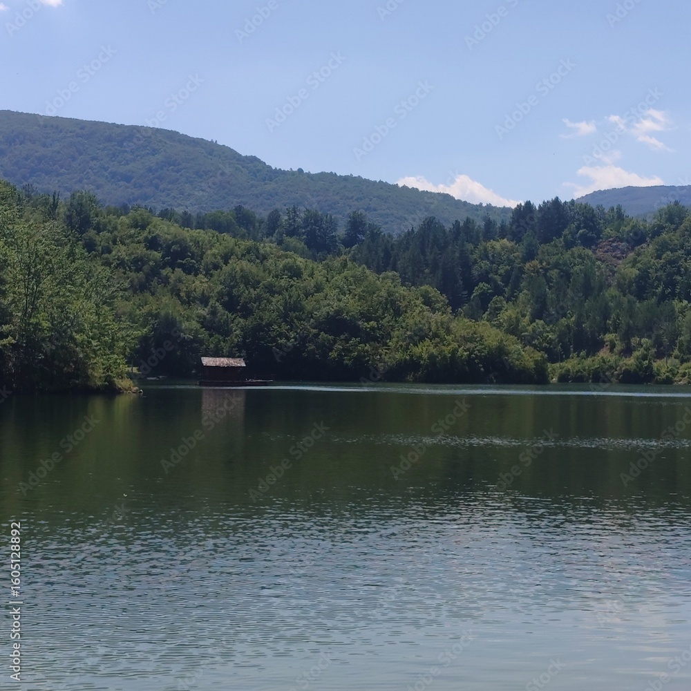 Fototapeta premium Tranquil Lake Scene in Radoinjsko Jezero