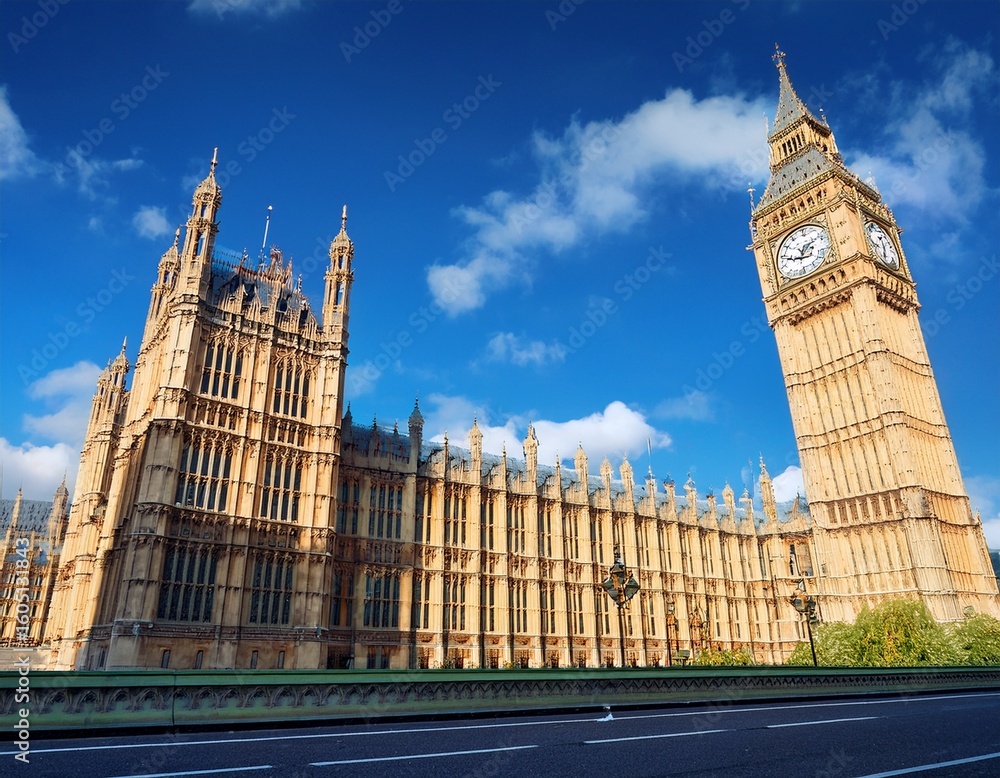 Fototapeta premium palace of westminster and big ben tower isolater on blue sky